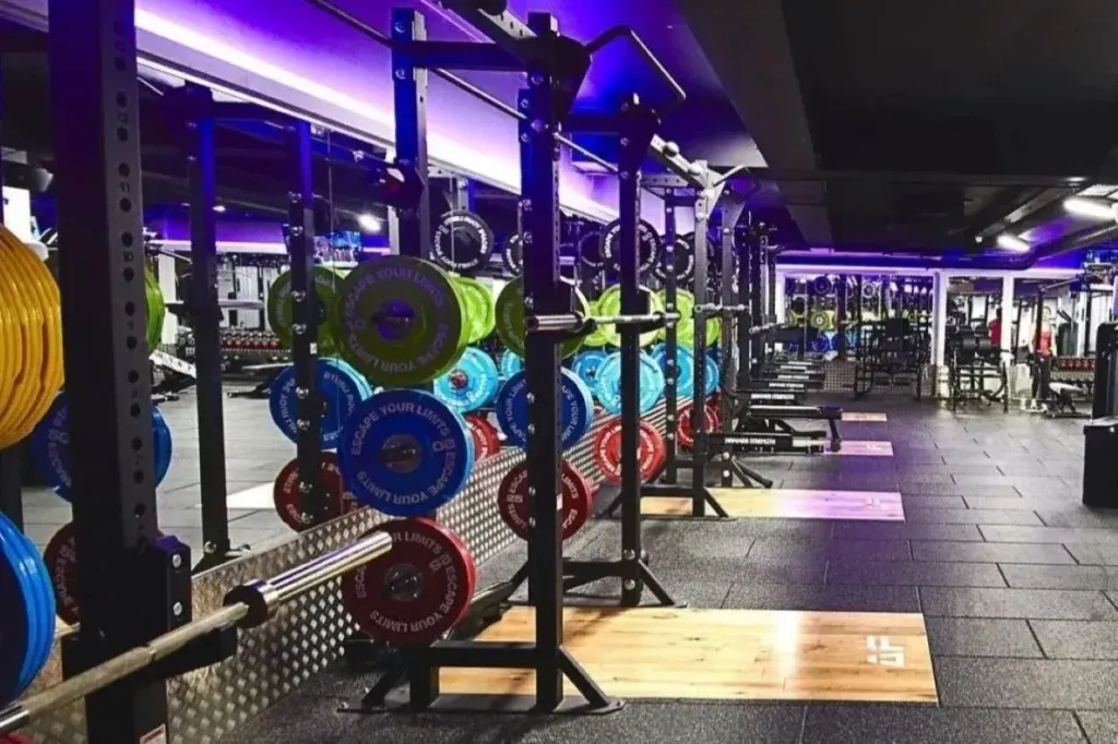 Anytime Fitness UK gym interior showing modern strength training equipment and weight racks